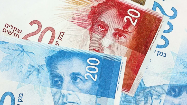 Dollar falls below three shekels for first time in over 30 years, annual inflation rate declines