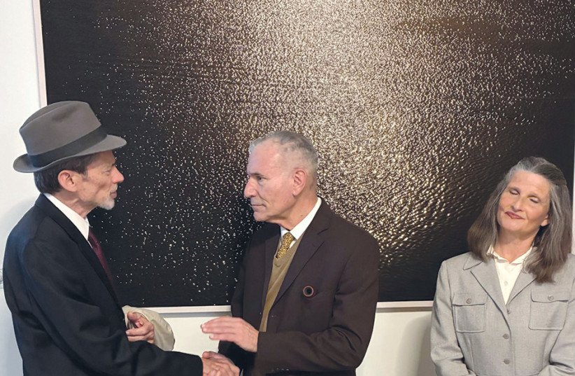 Heisenberg, played by David Golinkin (L), is greeted by Niels Bohr, played by Yehoshua Looks, with Bohr’s wife, Margarethe, played by Miriam Metzinger.