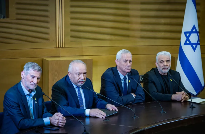 Yair Golan, Benny Gantz, Yair Lapid, and Avigdor Liberman hold a joint press conference at the Knesset, in Jerusalem, November 6, 2024