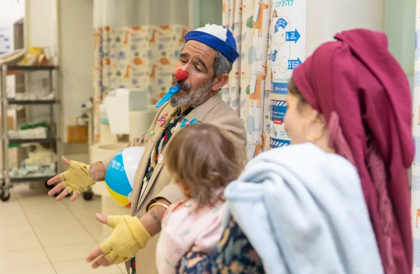 Dush the medical clown visits patients hospitalized at Hadassah Ein Karem hospital in Jerusalem on March 15, 2026.