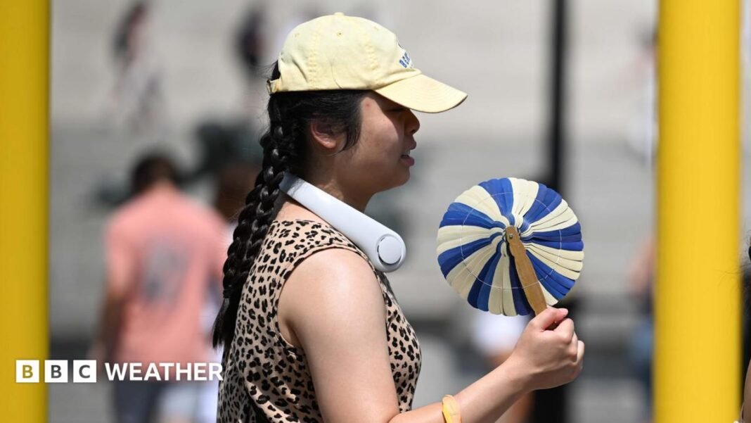 UK heatwave spreads further north and west as temperatures continue to climb